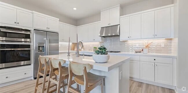Building Photo - This single-level condominium on the 3rd f...