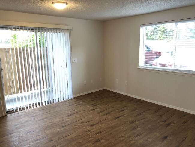 Spacious layout with sliding glass door that leads to your private patio