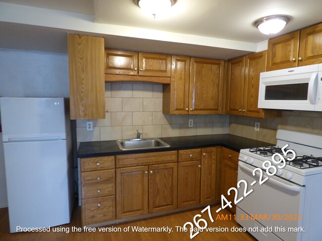 Building Photo - 126 S 46th St Unit AptC