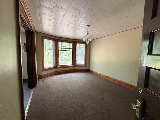 Building Photo - 3601 W Highland Blvd Unit 1