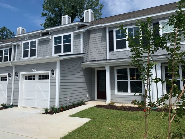 Building Photo - 4 Bedroom, 2.5 Bath, Pet Friendly Town Home with Garage Within Barefoot Resort and Golf! Availabl...