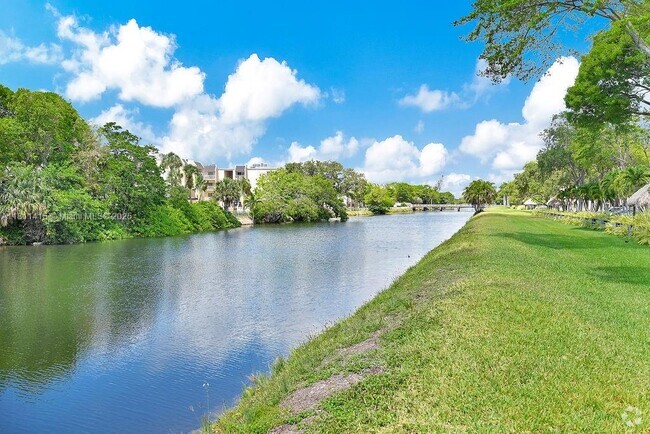 Building Photo - 7740 Camino Real Unit G-407 Rental