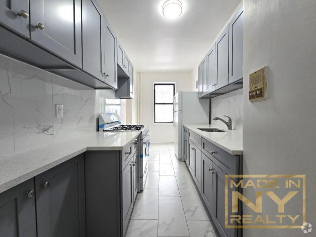 Building Photo - 2 bedroom in KEW GARDENS NY 11415 Unit ED2 Rental