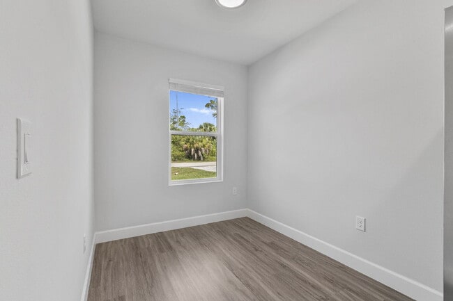 Photo - "Charming 3-Bed, 2-Bath Duplex Gem in Port Charlotte - Your Ideal Home Awaits!"