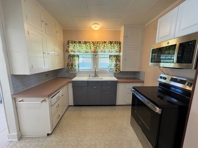 Photo - Spacious & Updated Home with Bonus Room, Large Basement, & Garage