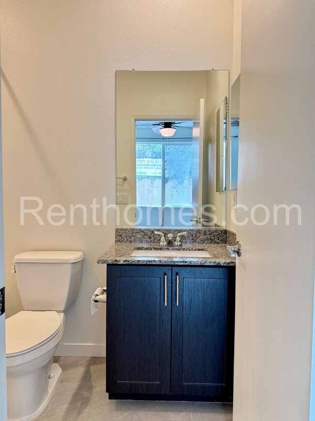 Photo - Otay Mesa, 5841 Seacliff Pl #95, LVP Flooring, Quartz Counters, 8 Solar Panels, AC, 2 Car Garage.