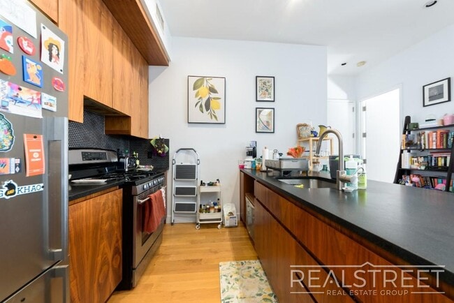 Photo - LOFT-LIKE 1 BED w PRIVATE ROOF DECK + LAUNDRY IN-UNIT Unit 4A