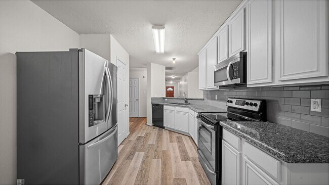Photo - Welcome home to this beautifully refreshed 3-bedroom, 2-bath home in the established Tejas Creek ...