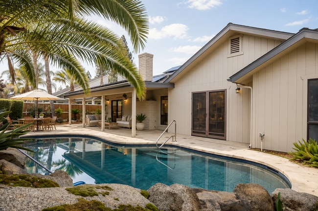 Photo - Drench Yourself in Luxury: 3-Bedroom Corner Oasis with a Sparkling Pool!