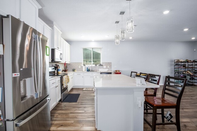 Photo - Spacious 3BR Home with Flex Space, Large Backyard & Open Floor Plan