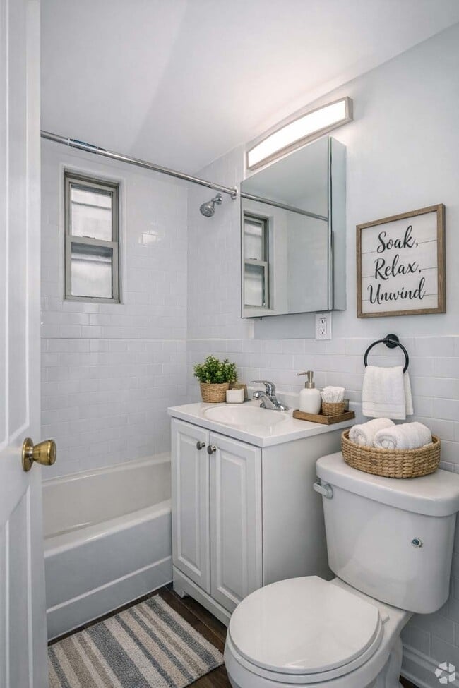 2BR, 1BA - 771SF - Bathroom - Virtually Staged - Elmwood Terrace Apartments