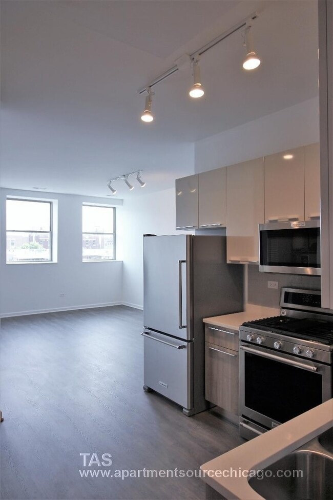 Photo - Gut rehabbed 3 bedroom 2 bath TOP FLOOR loft-style unit in WRIGLEY! Unit 401