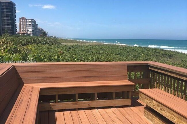 Building Photo - 3880 N Hwy A1A Unit 102