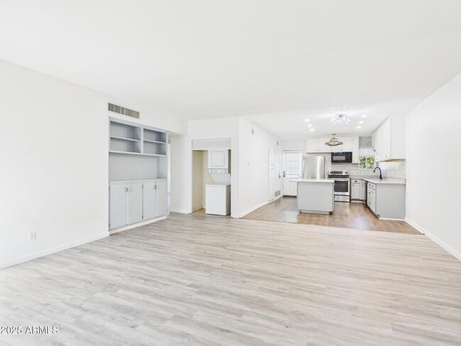 Building Photo - 6501 N 17th Ave Unit 208