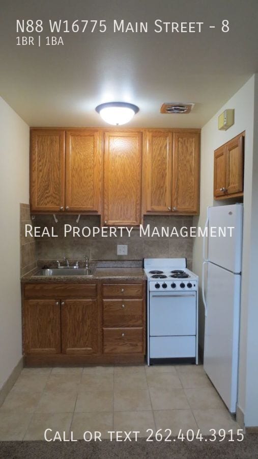 Building Photo - N88W16775-W16775 Main St Unit 8 Rental
