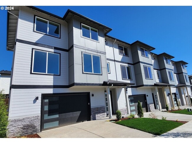 Building Photo - Spacious and Light-Filled Newly Built Condo Offering an Open Layout, Island Kitchen, and Outdoor ...