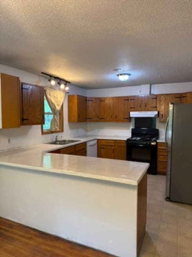 Building Photo - 4521 Lauesen Ave Unit 1