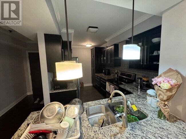Photo - 18 William Carson Crescent Unit 221