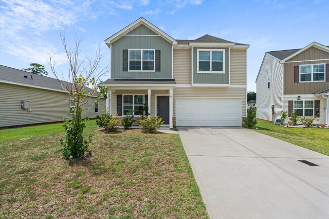 Photo - 4 Bedroom, 2.5 baths, with a 2 car garage located in Shell Point Farm.