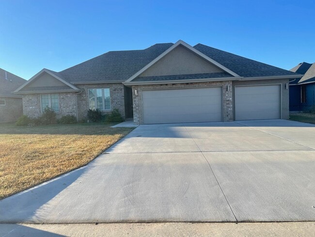 Building Photo - All Brick, 3 bedrooms AND 3 car garage