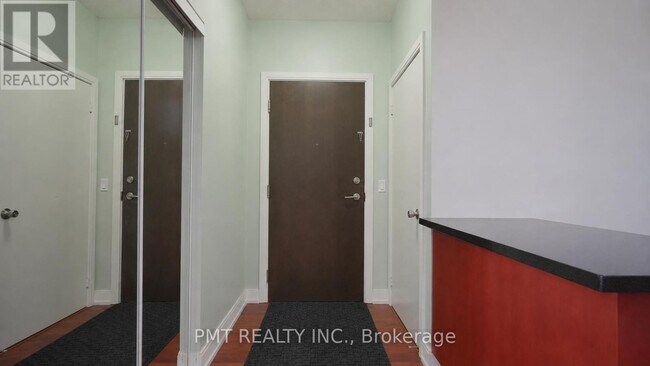 Photo - 125 Village Green Square Unit 309