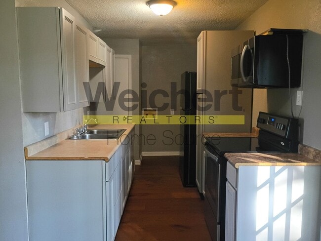 Photo - Charming 3-Bed Home with Fenced Yard and C...