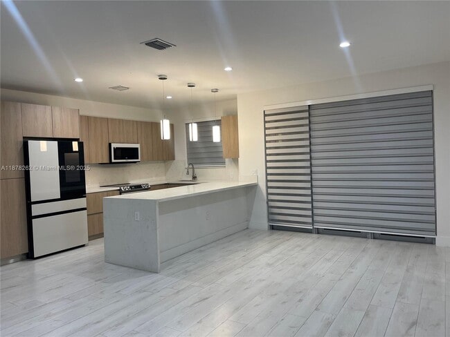 Building Photo - 3155 NW 103rd St Unit 3155 Rental