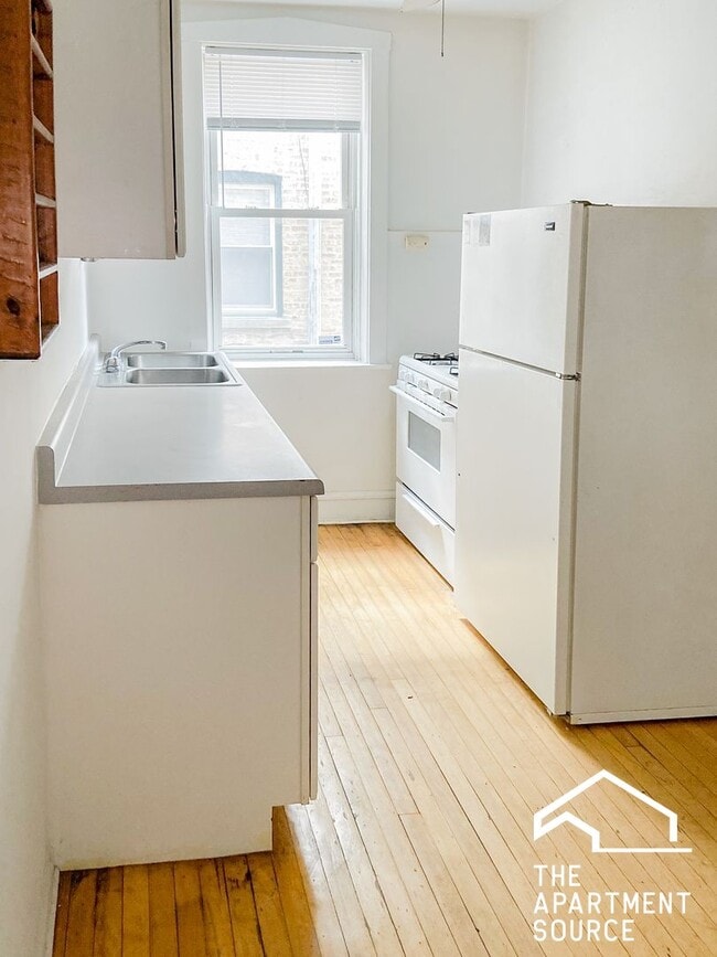Building Photo - 5034 N Wolcott Ave Unit 1
