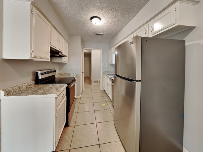 Photo - Alluring Single Family Home | 3 BR/2BA | 2-Car Covered Parking | Fencing wood