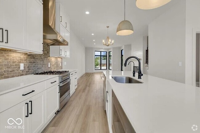 Kitchen dining and living room w/fireplace - 675 E 16th St Rental