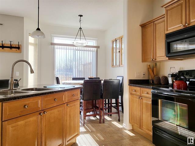 Photo - Duplex in Spacious 4-Bedroom Duplex • 3.5 Baths • Double Garage • Finished Basement Unité 108