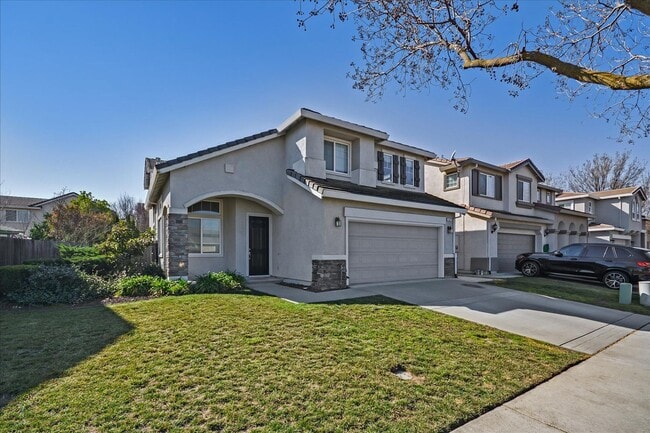 Building Photo - OPEN & SPACIOUS, 4 BEDROOM, 3 BATH 2 STORY... Rental