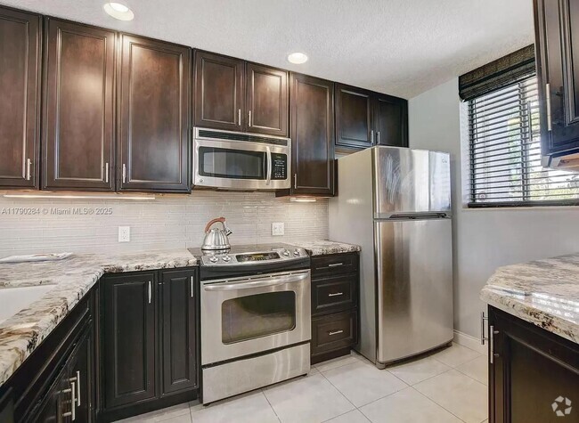 Building Photo - 4345 Trevi Ct Unit 202 Rental