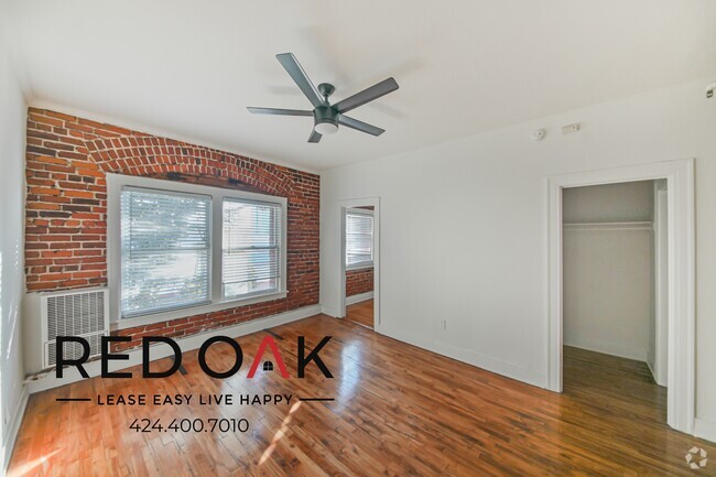 Building Photo - Sophisticated Studio with Exposed Brick Wa... Unit 106 Rental