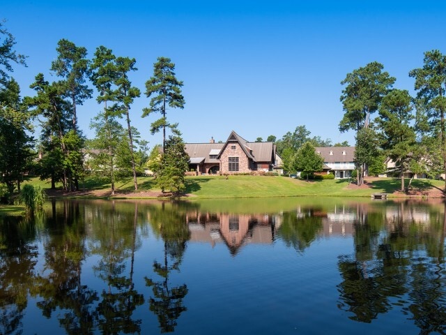 Enjoy serene lakeside views at The Cottages of Hattiesburg.