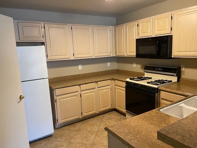 Photo - Spacious Condo with Loft & 2-Car Garage – Minutes from the Strip!