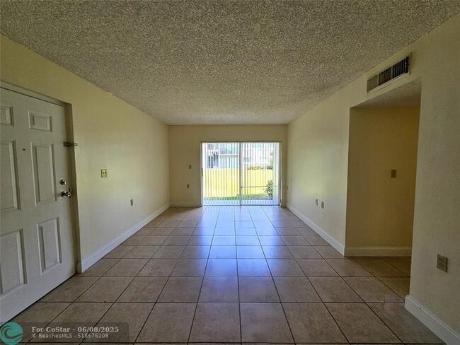 Photo - 1215 Benoist Farms Rd Condo Unit 103