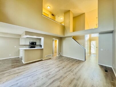 Photo - "Charming 2-Bed, 2-Bath Townhouse with Gleaming Hardwood Floors in Saint Anthony!"