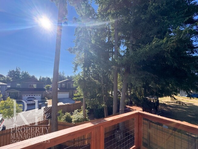Photo - Spacious 3-Story Home with Flexible Living Space, Heat Pump & Private Deck Retreat
