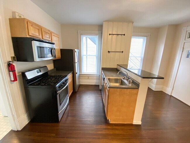 106-108 W Tompkins St