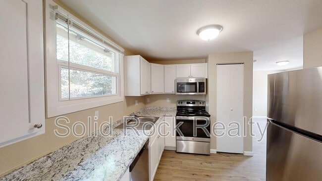 Building Photo - 2413 E St Vrain St Unit 102 Rental