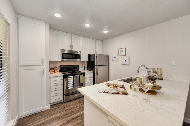 Kitchen with White Cabinets & Pantry