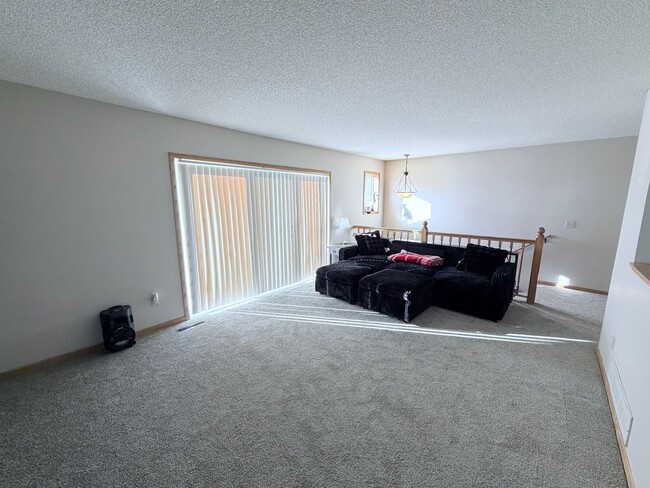 Photo - Spacious 2-Bedroom, 2.5 Bathroom, Tri-Level Townhome & Private Deck in Apple Valley!