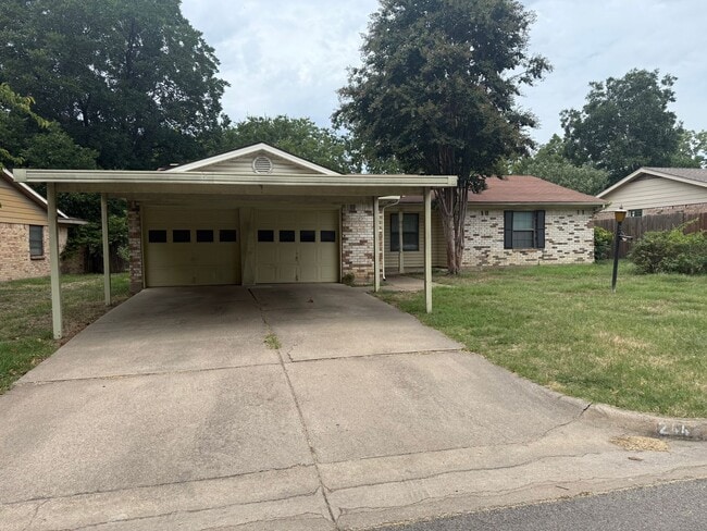 Building Photo - 3 Bed | 2 Bath | 2-Car Garage + Carport – ... Rental