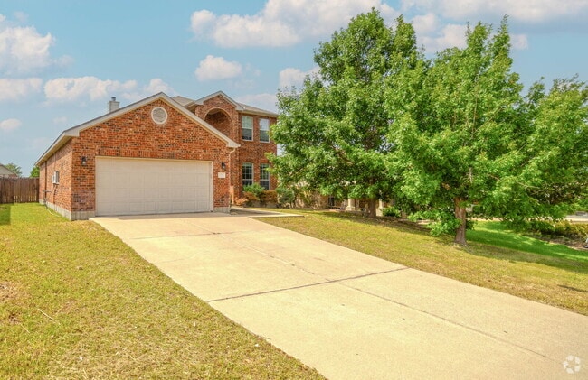 Building Photo - "Spacious 4-Bedroom Retreat with 2.5 Baths... Rental