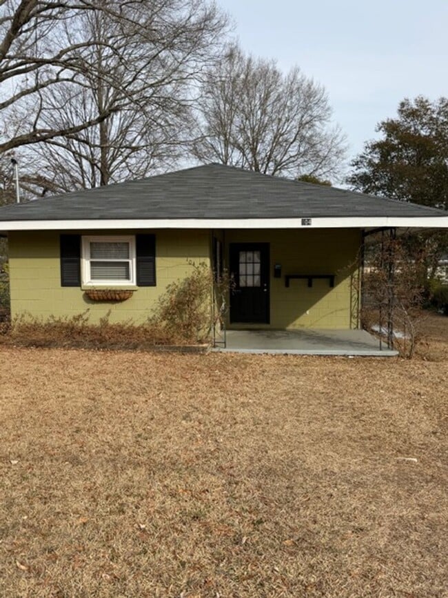 Building Photo - Tranquility inside. City adventures outside. Discover both in Downtown Cary!