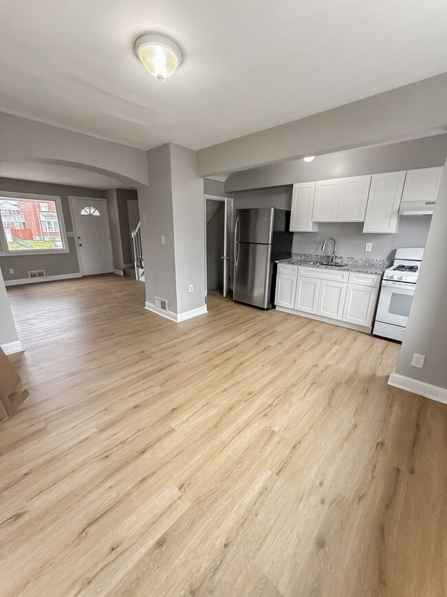 Photo - Home with Modern Kitchen, Finished Basement & Backyard Deck