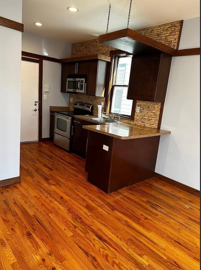 Photo - 68 W 19th St Unit Apartment 4