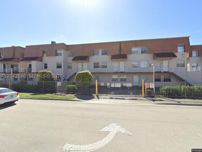Building Photo - 1560 W 46th St Unit 244