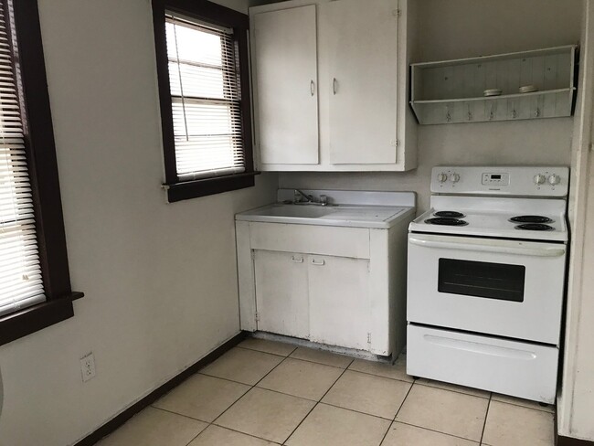205 1/2 West 61st St.
